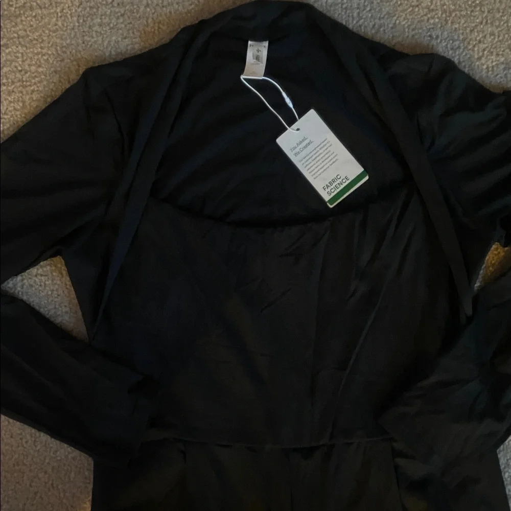 XLARGE.  HALARA LONG SLEEVE WIDE LEG EASY PEEZY JUMPSUIT - Picture 7 of 11